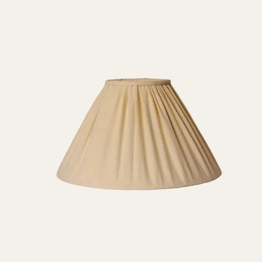 Beige pleated lampshade on a white background
