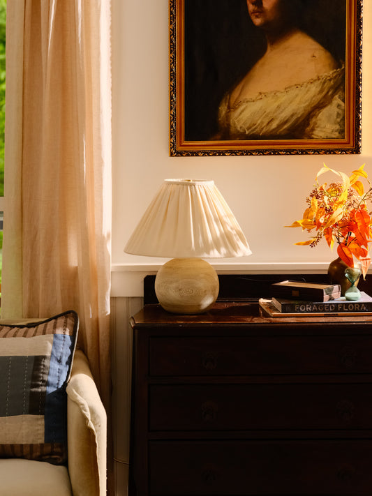 Small lamp in a cozy living room setting. 