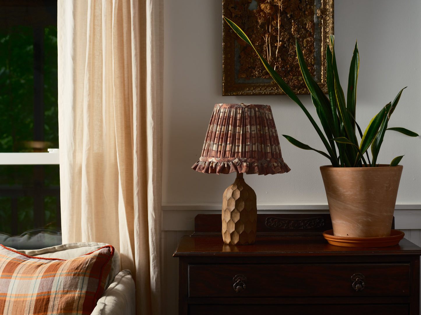  Lampshade made out of a red, cream and black block printed fabric. Gathered with a ruffle on bottom edge. 